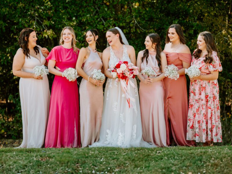 A Vibrant Fall Wedding at C&C by the Lake: Bright Pink and Red Hues, a Bubble Exit, and a Stunning Fireworks Finale