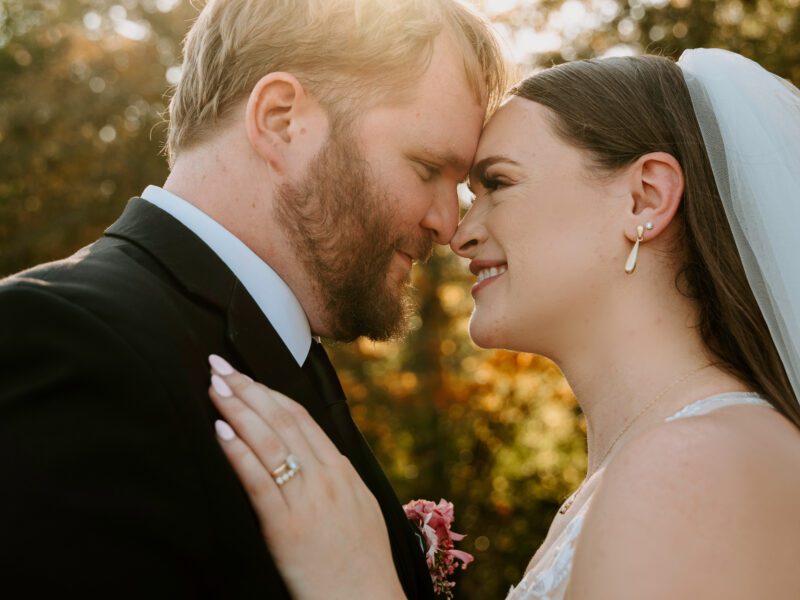 A Vibrant Fall Wedding at C&C by the Lake: Bright Pink and Red Hues, a Bubble Exit, and a Stunning Fireworks Finale