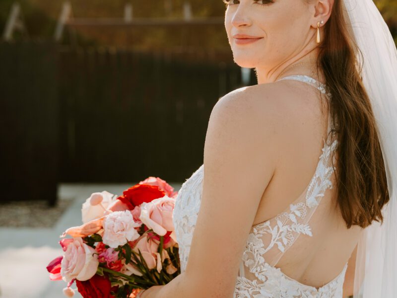 A Vibrant Fall Wedding at C&C by the Lake: Bright Pink and Red Hues, a Bubble Exit, and a Stunning Fireworks Finale