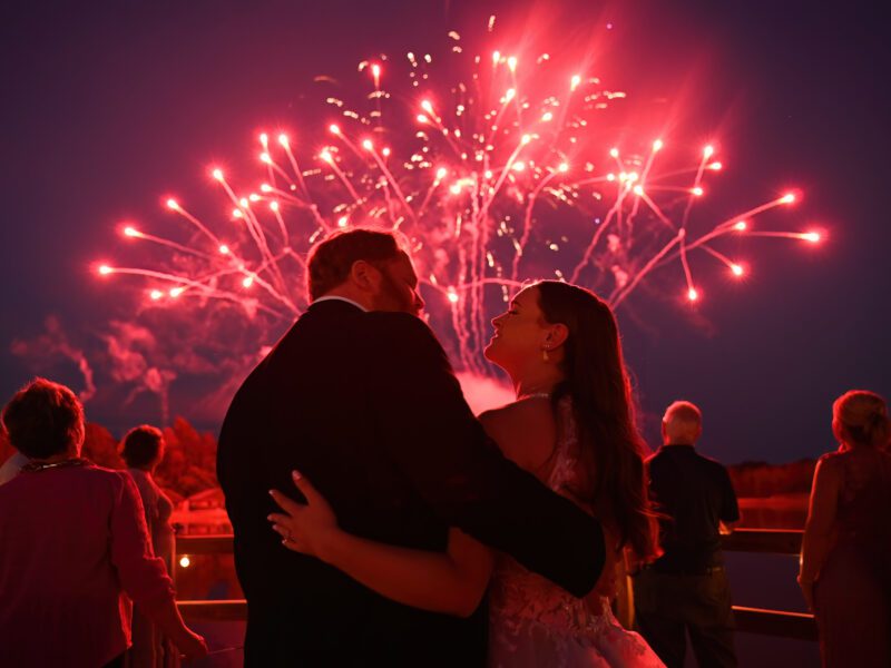 A Vibrant Fall Wedding at C&C by the Lake: Bright Pink and Red Hues, a Bubble Exit, and a Stunning Fireworks Finale